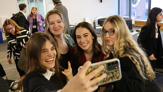 Besting 110 other teams of first-year students, the Saloniki consulting winners pose for a selfie.